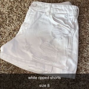 white ripped jean shorts
